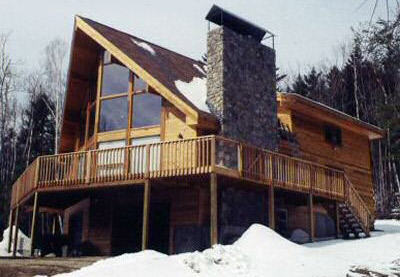 Log home with a Stone Fireplace